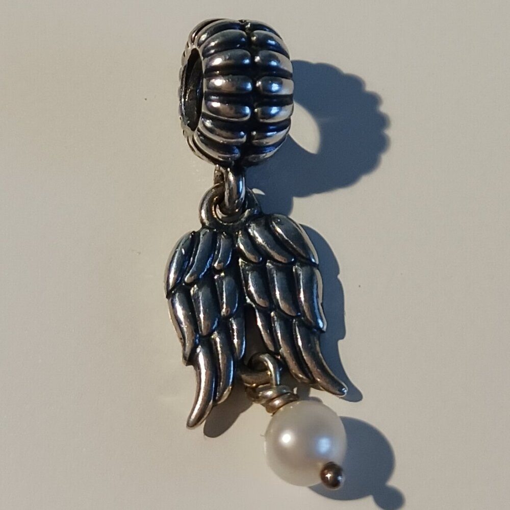 Authentic Pandora Angel wings with pearl drop charm